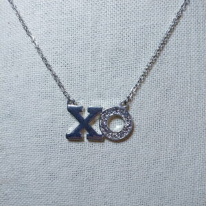 Sterling silver plated  CLAIRS clear sustainable XO pendant necklace 14 in