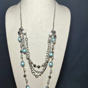 A lovely multi layers, white and aqua blue plastic pearls with silver chains necklace