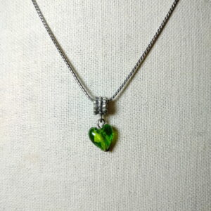 A hand made glass heart shape pendant with 18k gold plated necklace