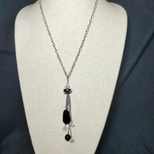 Silver tone necklace with black pendants