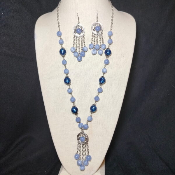 A set of blue beads necklace and earrings