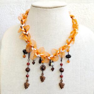 Pumpkin orange braided lace with brass tone charm chunky necklace