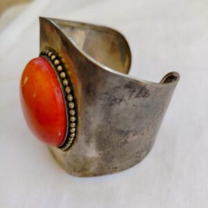 Vintage Native American silver tone and coral cuff bracelet