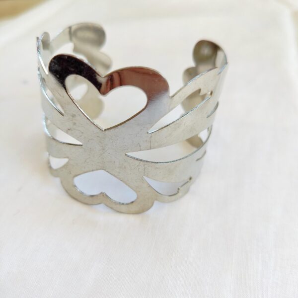 Silver tone wide cuff bracelet