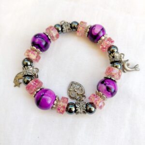 Beautiful handmade purple and silver charm elastic bracelet