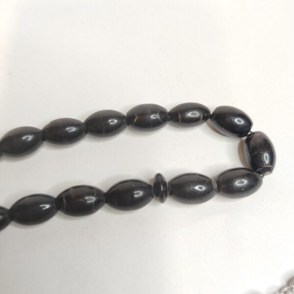 Natural Black Yusr Coral Prayer Beads – 33 Beads Misbaha with Silver color Tassel مسبحة يسر - مرجان طبيعي من النوادر - Image 2