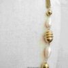 Vintage-Inspired Gold Chain Necklace with Textured Beads and Faux Pearls - Image 3