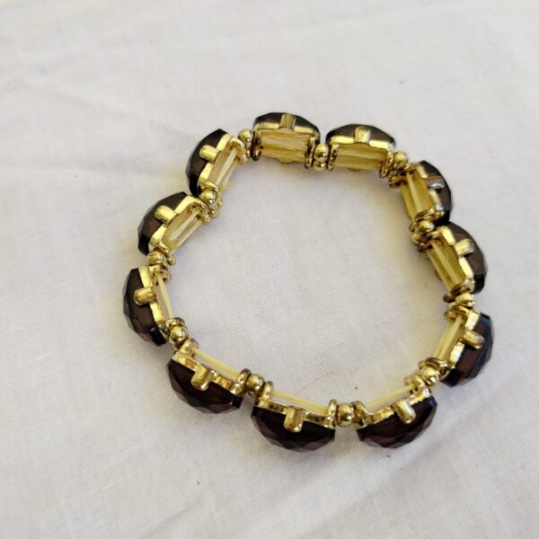 Elegant Burgundy Gemstone Bracelet with Gold-Tone Detailing - Image 2
