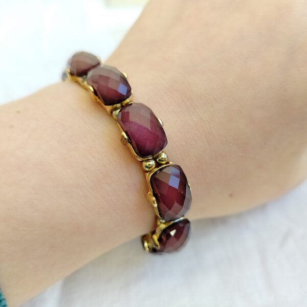 Elegant Burgundy Gemstone Bracelet with Gold-Tone Detailing - Image 3