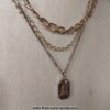 Elegant Layered Gold Chain Necklace with Rustic Crystal Pendant - Image 2