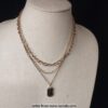 Elegant Layered Gold Chain Necklace with Rustic Crystal Pendant