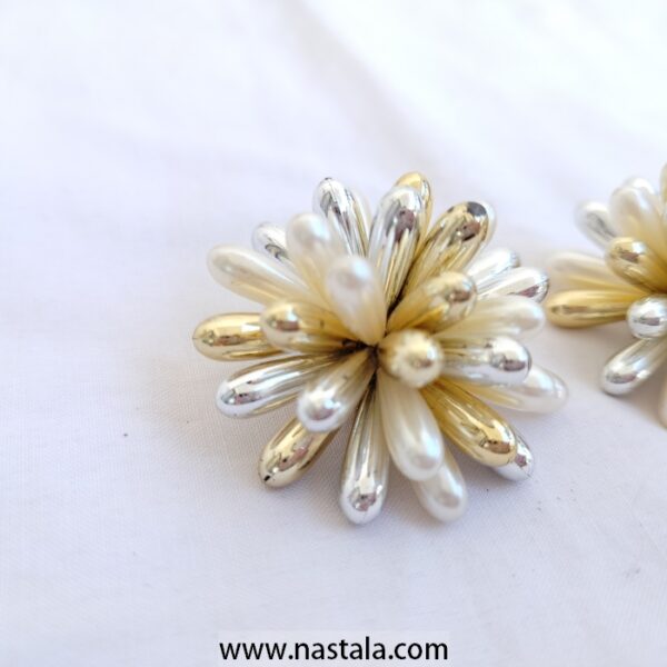 A pair of flower-shaped earrings with gold and silver accents | أقراط بتصميم زهري مع تفاصيل ذهبية وفضية - Image 4