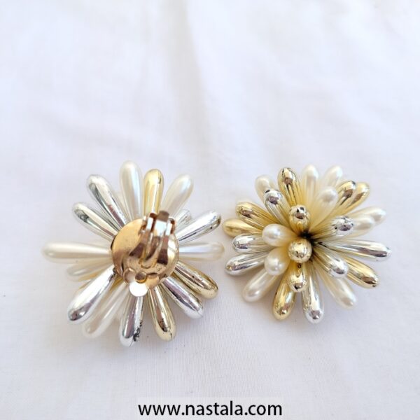 A pair of flower-shaped earrings with gold and silver accents | أقراط بتصميم زهري مع تفاصيل ذهبية وفضية - Image 3