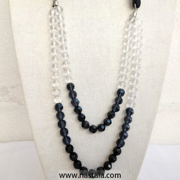 A layered necklace with black and clear beads | قلادة متعددة الطبقات مع خرز أسود وشفاف - Image 6