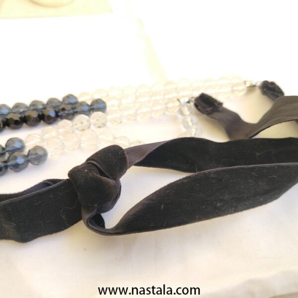 A layered necklace with black and clear beads | قلادة متعددة الطبقات مع خرز أسود وشفاف - Image 2