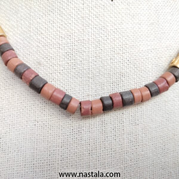 A necklace with colorful cylindrical beads and golden accents | قلادة مع خرز أسطواني ملون وتفاصيل ذهبية - Image 4
