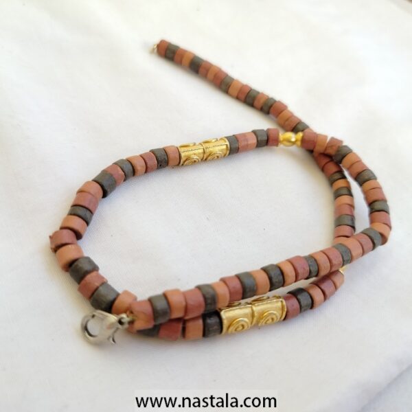 A necklace with colorful cylindrical beads and golden accents | قلادة مع خرز أسطواني ملون وتفاصيل ذهبية - Image 3