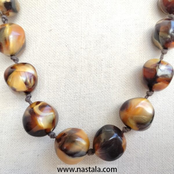 A necklace with large, round plastic beads in warm tones | قلادة من خرز بلاستيكي كبير ودائري بألوان دافئة - Image 5