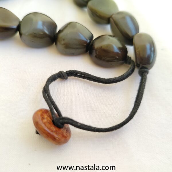 A necklace made with polished obsidian beads | قلادة مصنوعة من خرز الأوبسيديان المصقول - Image 4