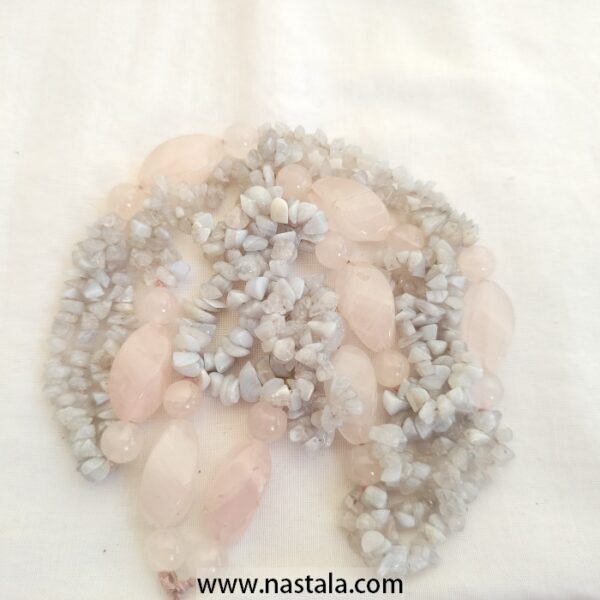A necklace made with natural rose quartz and chip stones | قلادة مصنوعة من العقيق الوردي الطبيعي وحجارة الرقائق - Image 3