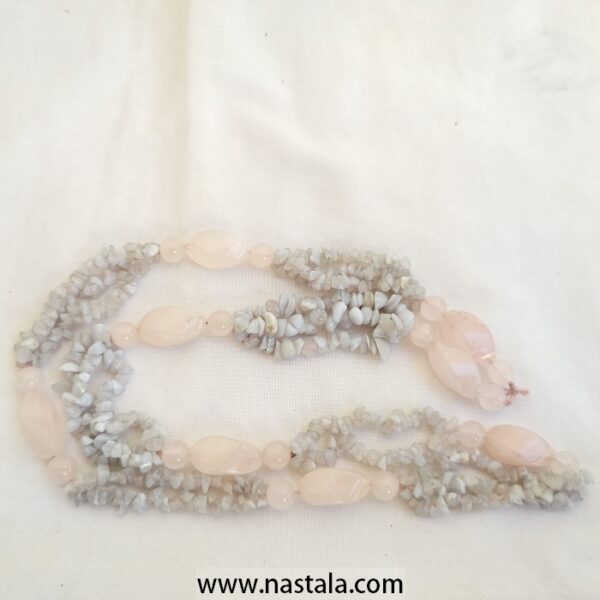 A necklace made with natural rose quartz and chip stones | قلادة مصنوعة من العقيق الوردي الطبيعي وحجارة الرقائق - Image 2
