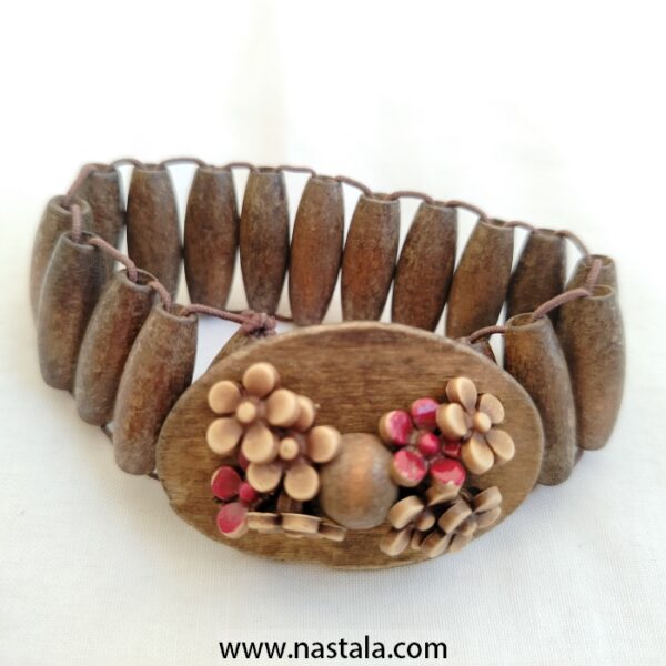 A wooden bracelet with floral embellishments | سوار خشبي مع زينة زهرية - Image 3
