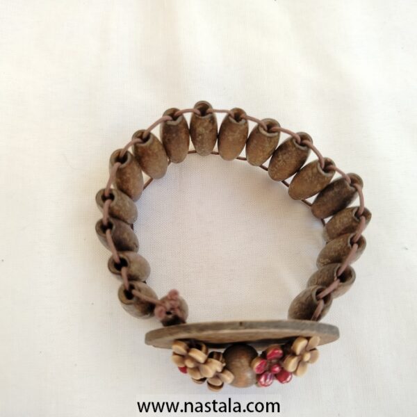 A wooden bracelet with floral embellishments | سوار خشبي مع زينة زهرية - Image 2