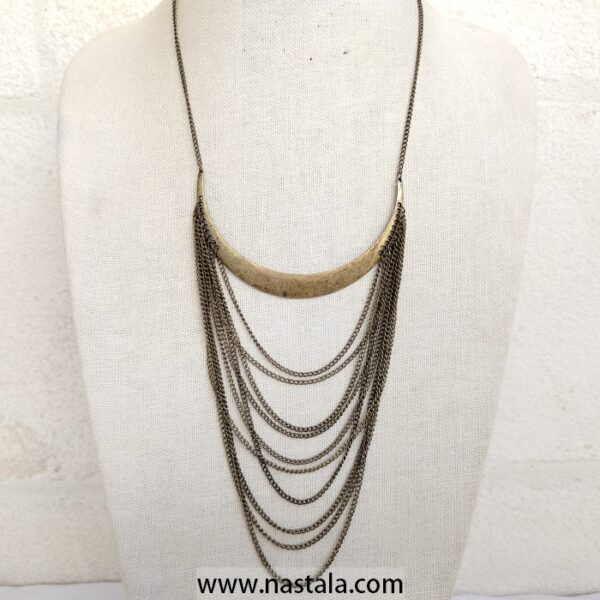 A boho-style necklace with layered chains and a crescent pendant | قلادة بأسلوب بوهيمي مع سلاسل متعددة وقلادة هلالية