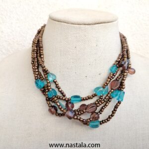 A multi-strand necklace with turquoise and brown beads | قلادة متعددة الخيوط مع خرز تركوازي وبني
