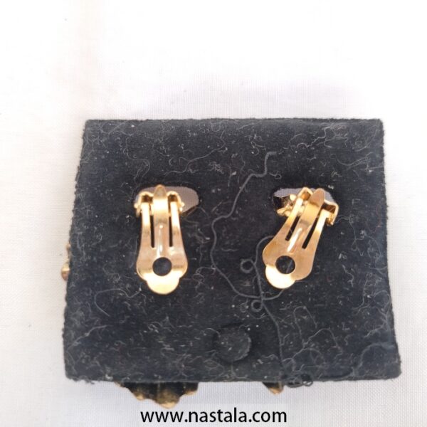 Gold-tone leaf earrings with a faux pearl | أقراط بشكل ورقة بلون ذهبي مع لؤلؤ صناعي - Image 2