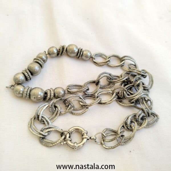 A silver-tone necklace with linked chains and round beads | قلادة بتصميم سلسل فضي مع خرز دائري - Image 4