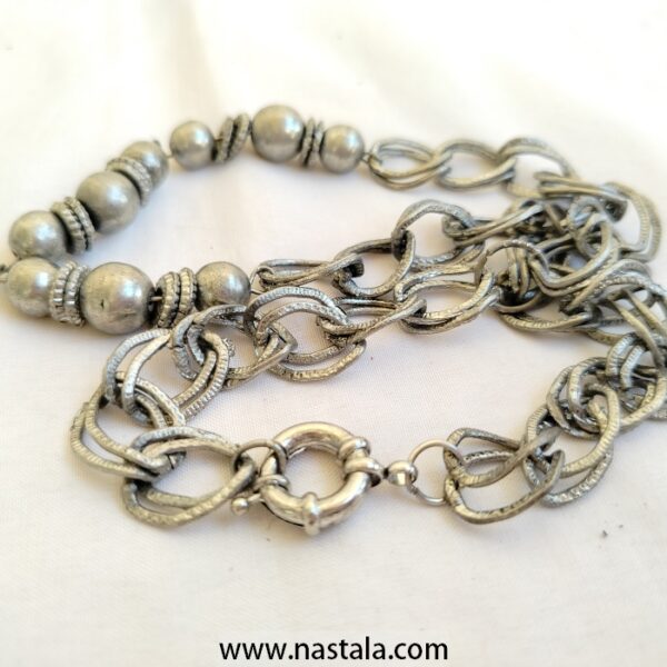 A silver-tone necklace with linked chains and round beads | قلادة بتصميم سلسل فضي مع خرز دائري - Image 2