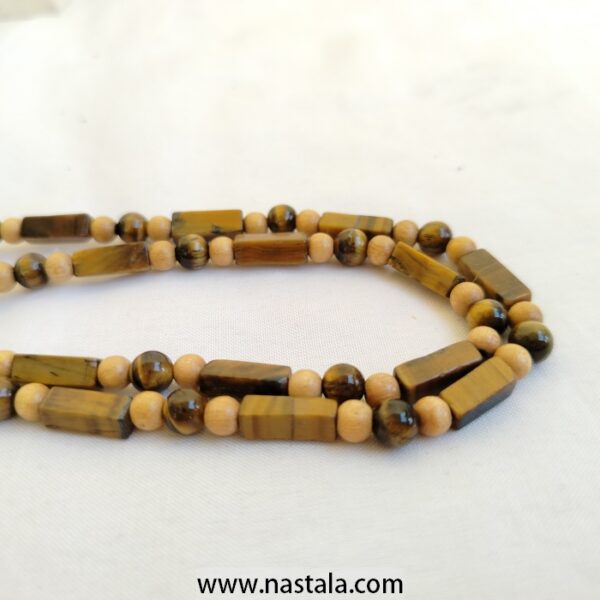 A necklace made with cat eye natural stone beads | قلادة مصنوعة من خرز حجر عين القط الطبيعي - Image 2