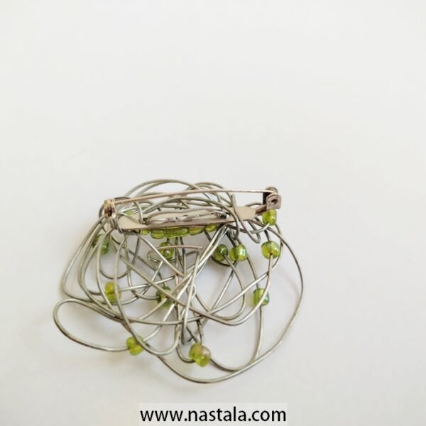 A tangled wire pendant with green beads | قلادة من أسلاك متشابكة مع خرز أخضر - Image 2