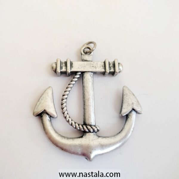 A silver anchor pendant | قلادة على شكل مرساة فضية