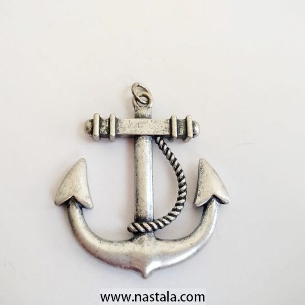 A silver anchor pendant | قلادة على شكل مرساة فضية - Image 2