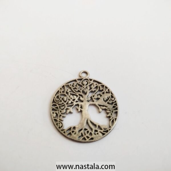 A pendant featuring a tree of life design | قلادة مع تصميم شجرة الحياة - Image 2