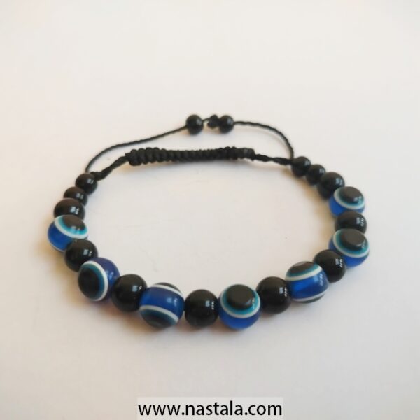 A bracelet with blue   beads | سوار مع خرز أزرق